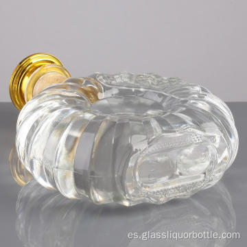 Botella de licor de cristal transparente